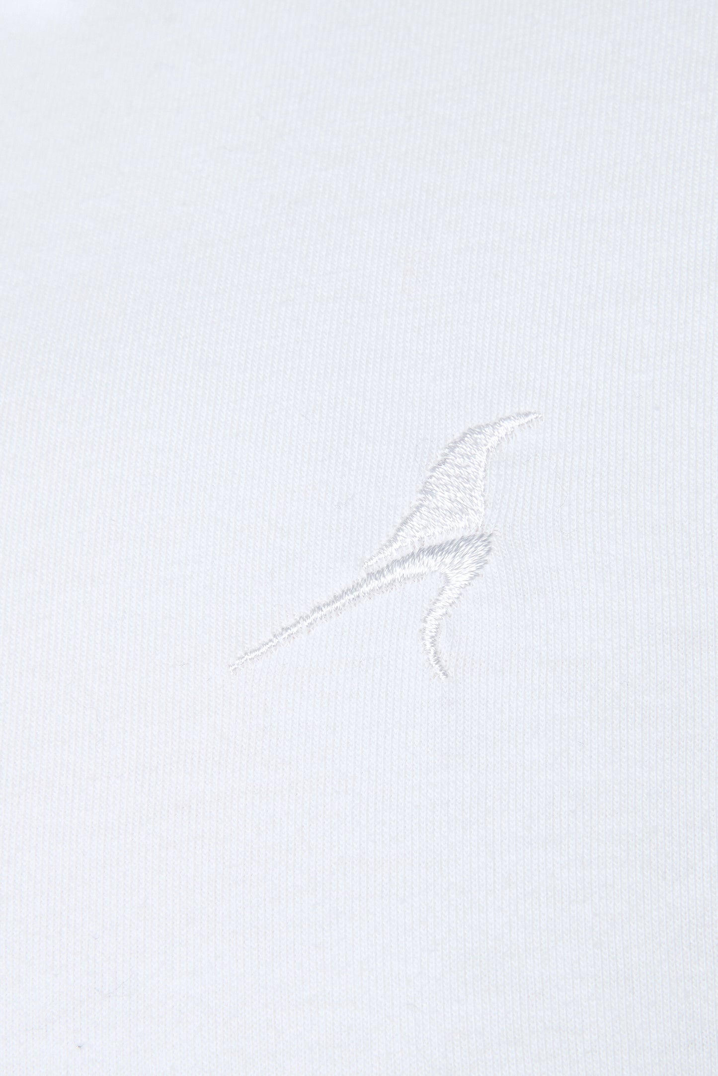 White polo with white embroidery