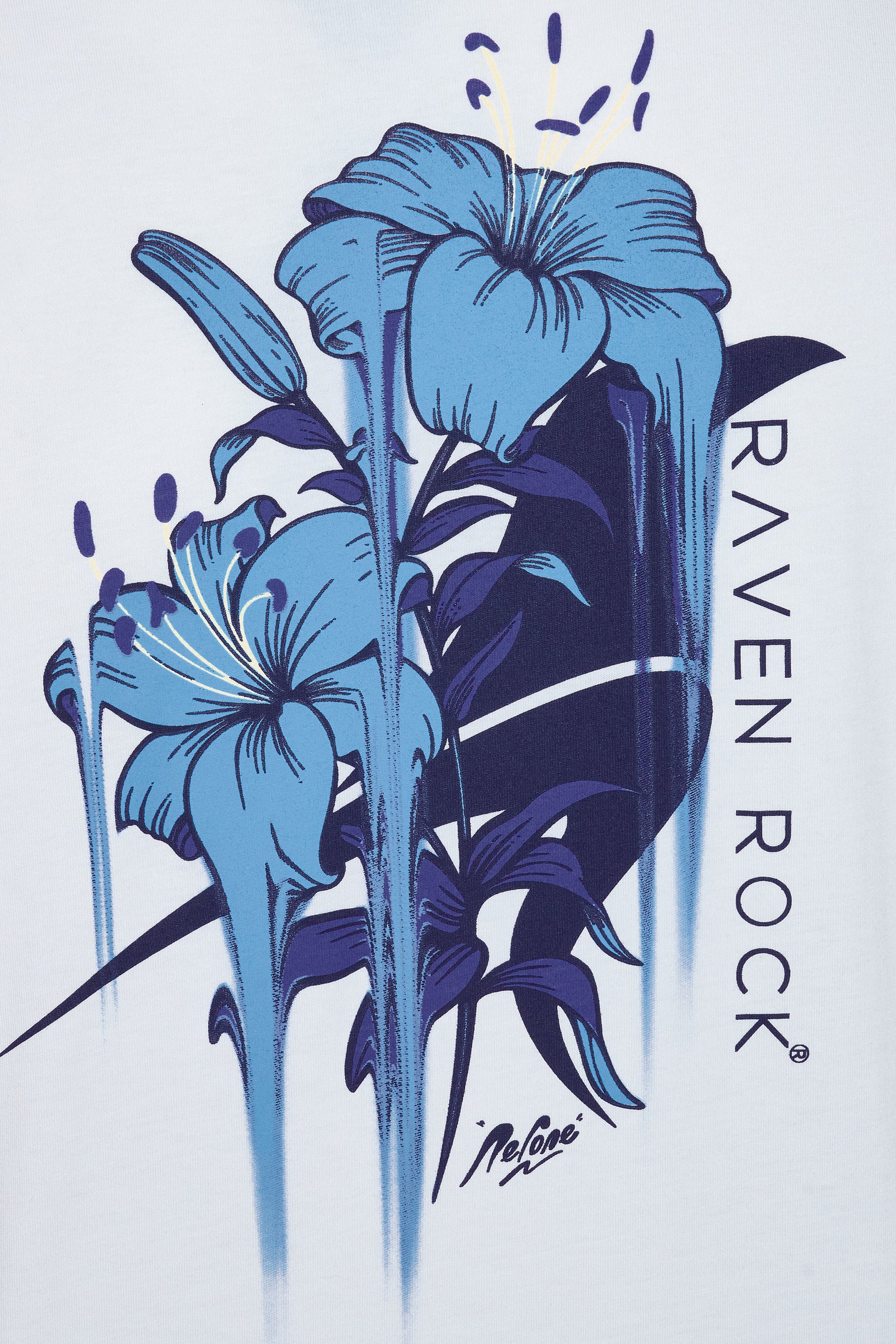 Close-up of Nerone floral screen print on back of white t-shirt – made in the UK charity t-shirt