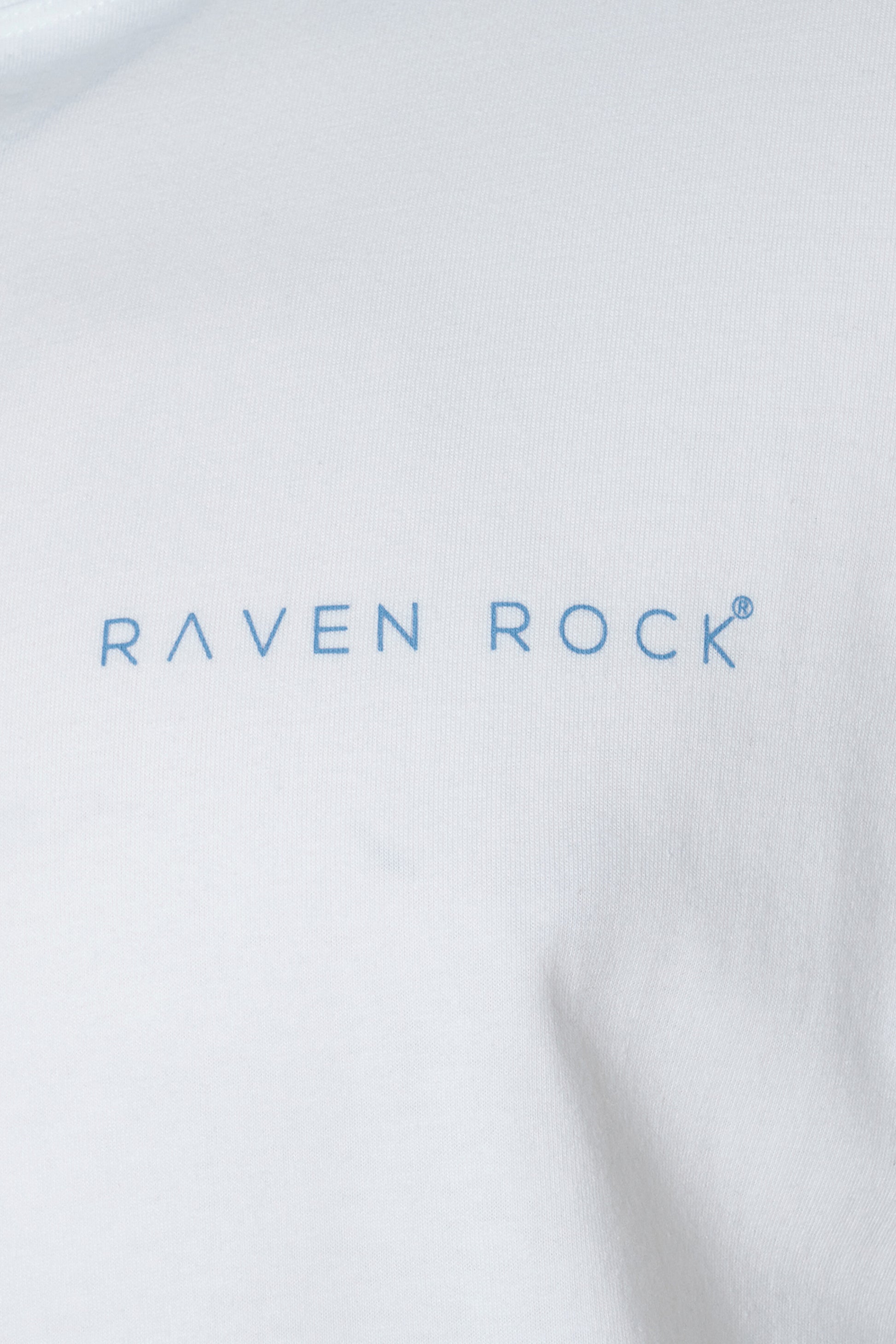 Close-up of chest logo on white British-made t-shirt – traceable cotton, UK production