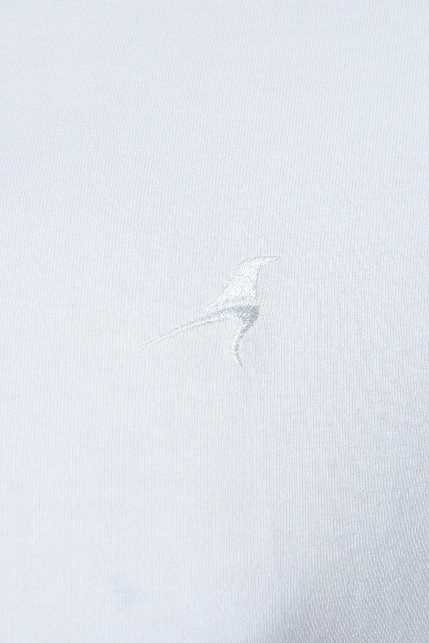 RAVEN ROCK embroidery on chest of white t-shirt
