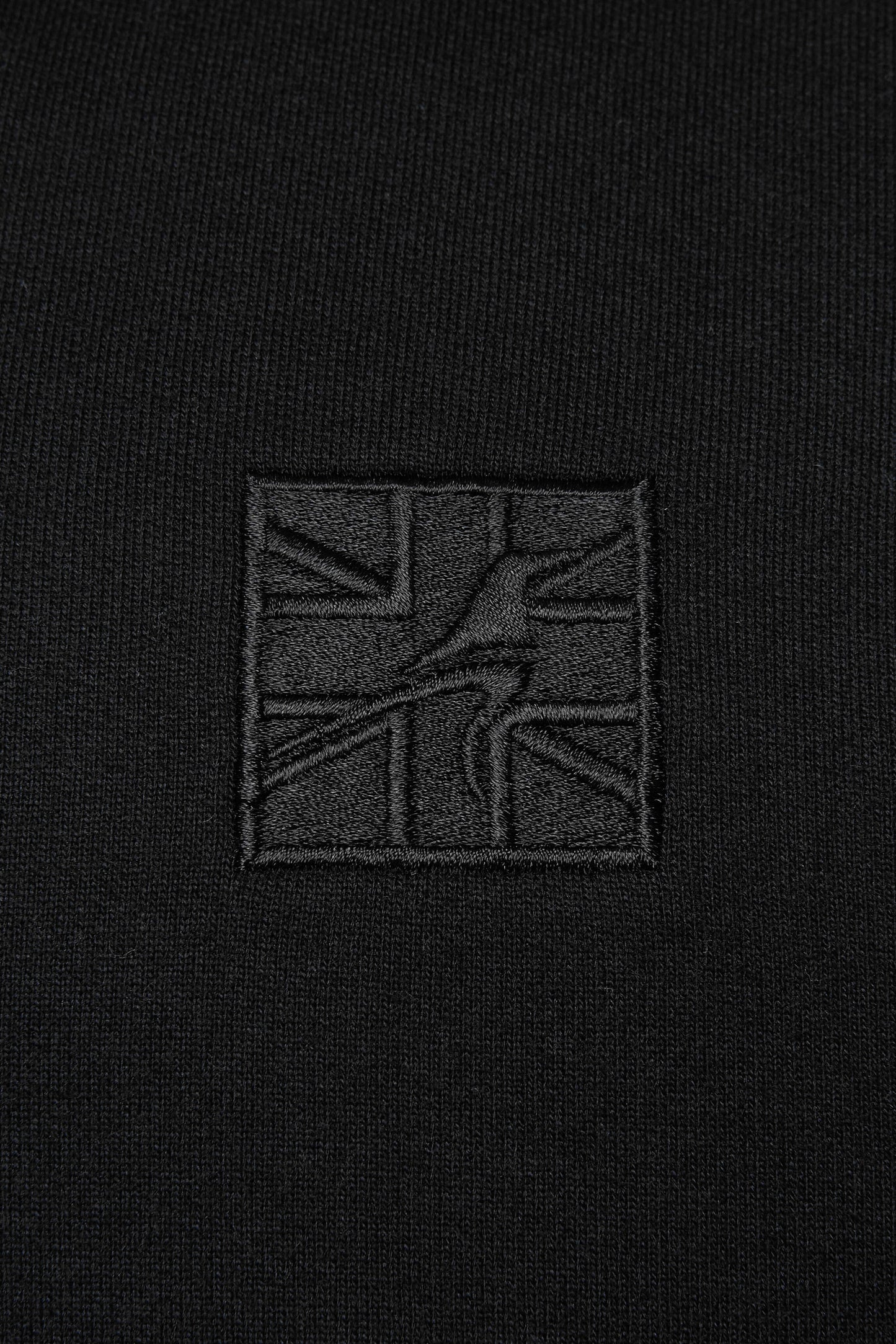 Embroidered black logo on a men's black hoodie