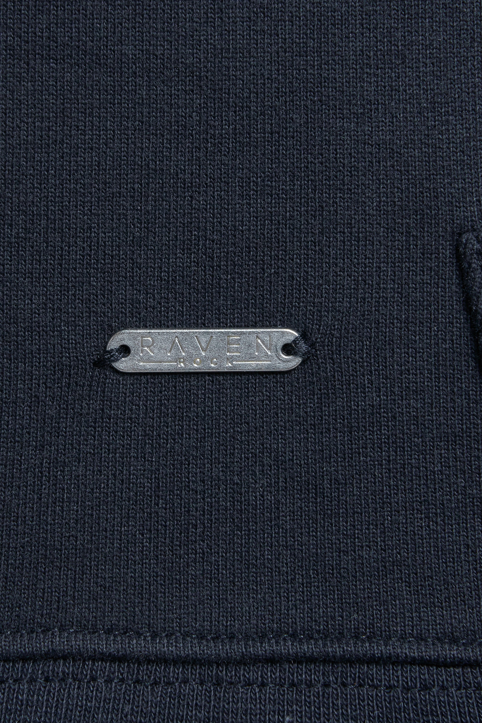 Navy hoodie with metal branded tag